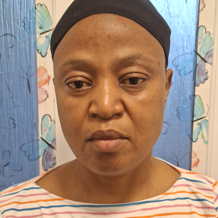 Mary Enuwa E, carer